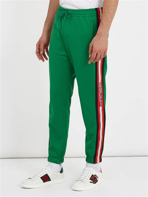 gucci green stripe track pants men|gucci side stripe track pants.